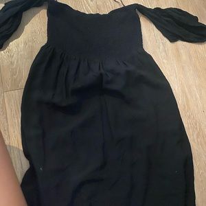 Black off the shoulder and smocked dress